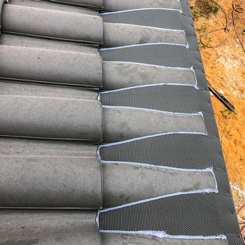  Gutter Guard mesh protection on a Swiss tiled roof 